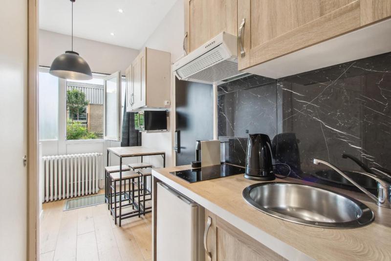 165 Suite Denis - Superbe Appartement A Parigi Esterno foto